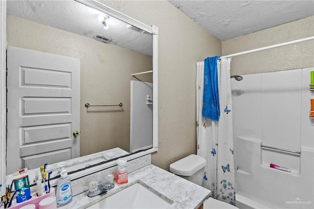 full bathroom with toilet, a textured ceiling, vanity, and shower / tub combo with curtain