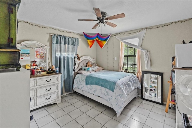 tiled bedroom with ceiling fan