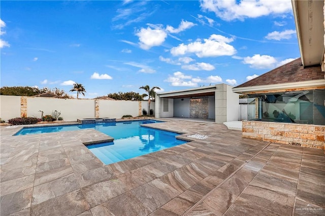 view of pool featuring a gazebo, a patio area, and an in ground hot tub