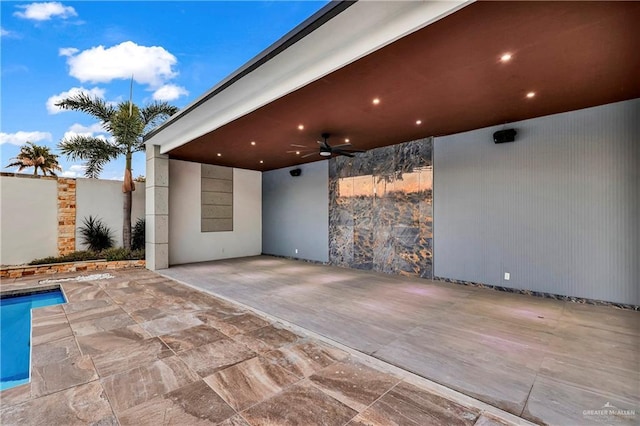 view of patio with ceiling fan