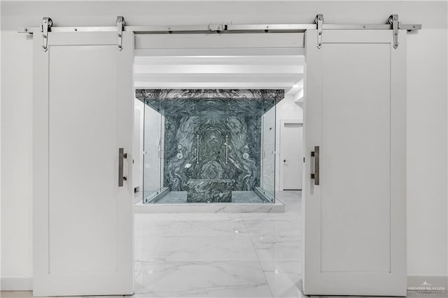 interior details featuring a barn door