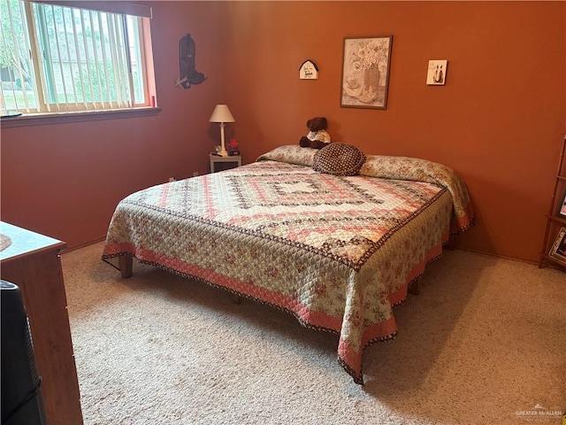 bedroom featuring carpet flooring