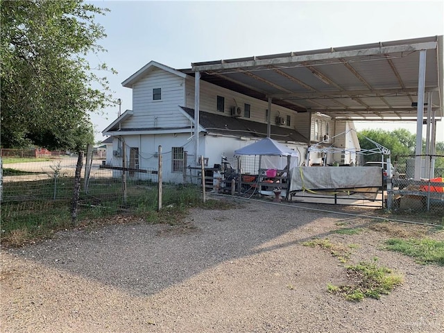 exterior space featuring a carport