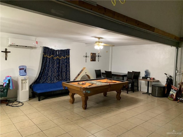 rec room with light tile patterned floors, a wall unit AC, ceiling fan, and billiards