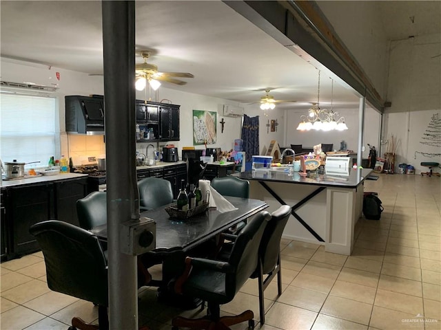 tiled dining space featuring ceiling fan with notable chandelier