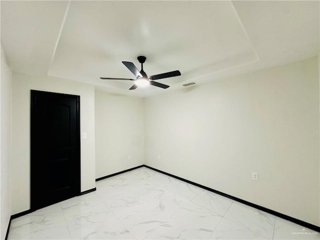 spare room featuring ceiling fan