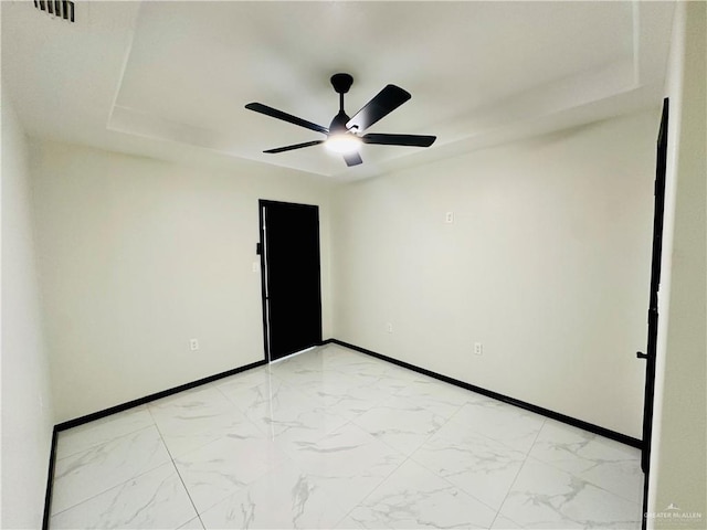 spare room featuring ceiling fan