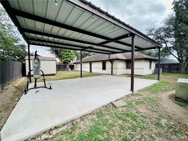 view of patio / terrace with a storage unit