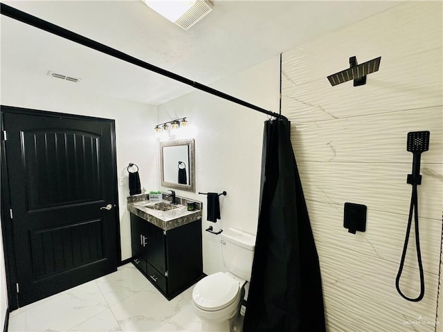 bathroom featuring vanity, toilet, and a shower with curtain