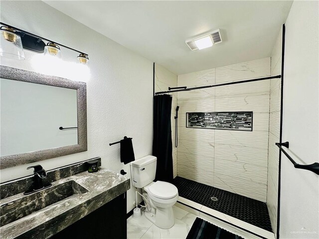 bathroom featuring vanity, a shower with curtain, and toilet