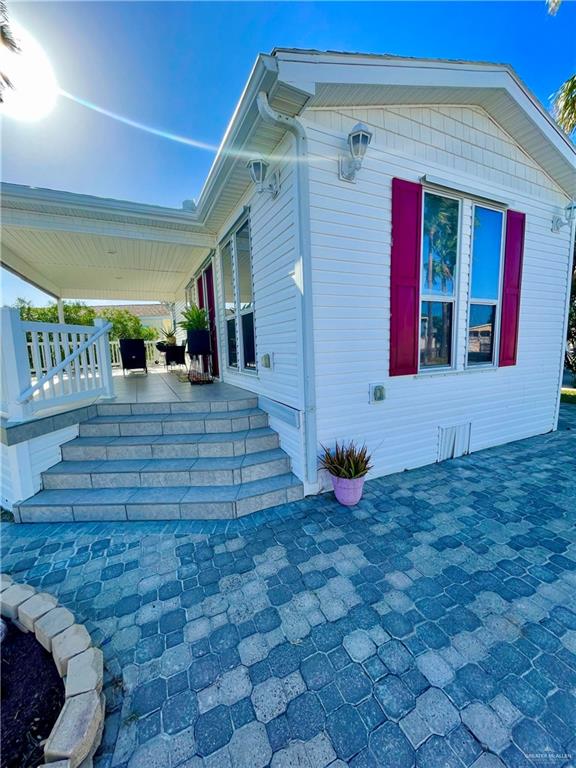 view of home's exterior featuring covered porch