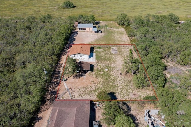 birds eye view of property featuring a rural view