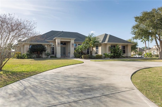 single story home featuring a front yard