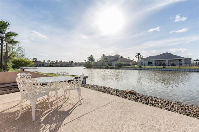 view of patio featuring a water view