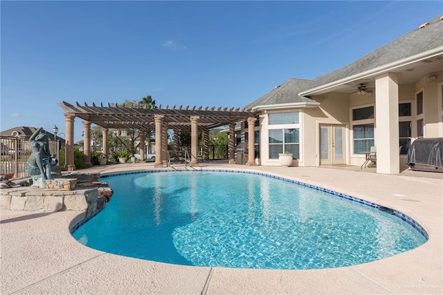 view of swimming pool featuring a pergola and a patio