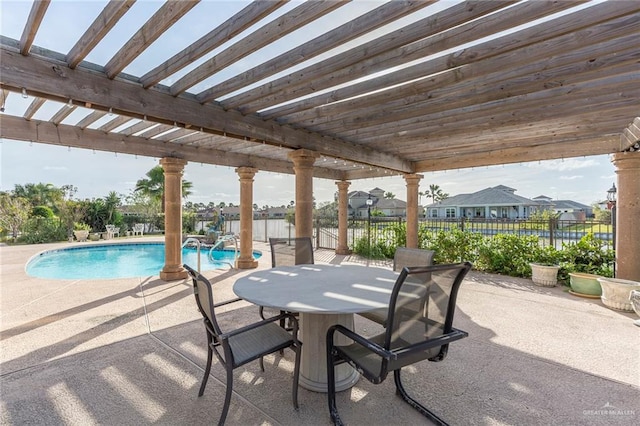 view of swimming pool with a pergola and a patio area