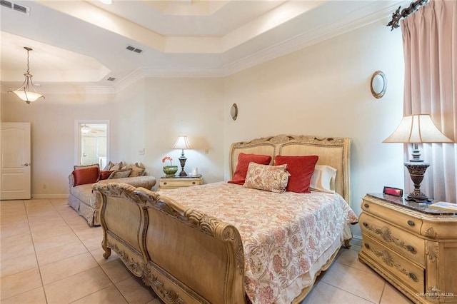 tiled bedroom featuring a raised ceiling and crown molding