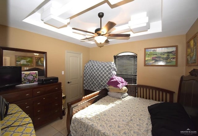 bedroom with light tile patterned flooring and ceiling fan