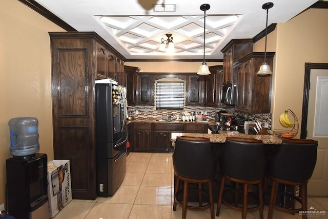 kitchen featuring coffered ceiling, a peninsula, dark brown cabinetry, stainless steel microwave, and black refrigerator with ice dispenser