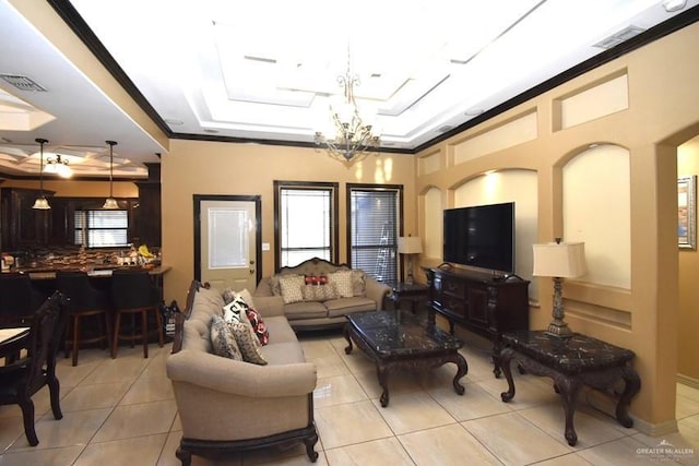 living area featuring visible vents, ornamental molding, light tile patterned flooring, a raised ceiling, and a chandelier