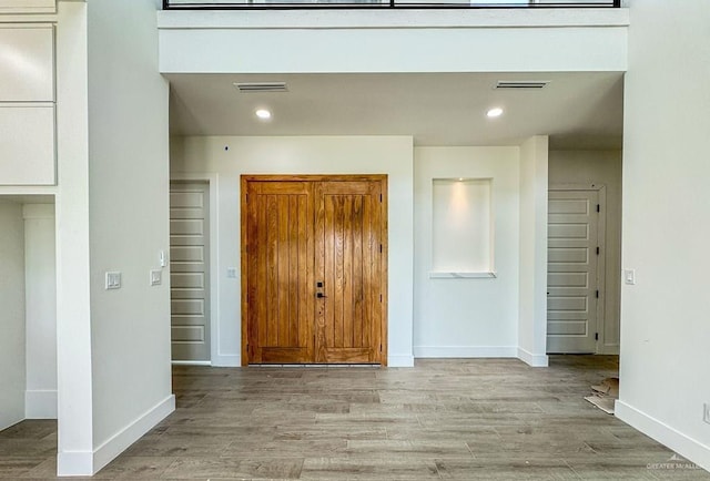 interior space with light hardwood / wood-style flooring