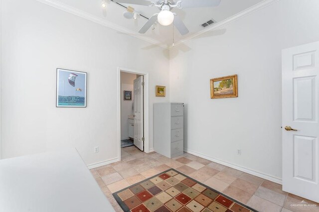 131 E Hibiscus St, South Padre Island, TX 78597 - unfurnished bedroom featuring baseboards, visible vents, ceiling fan, ensuite bathroom, and crown molding