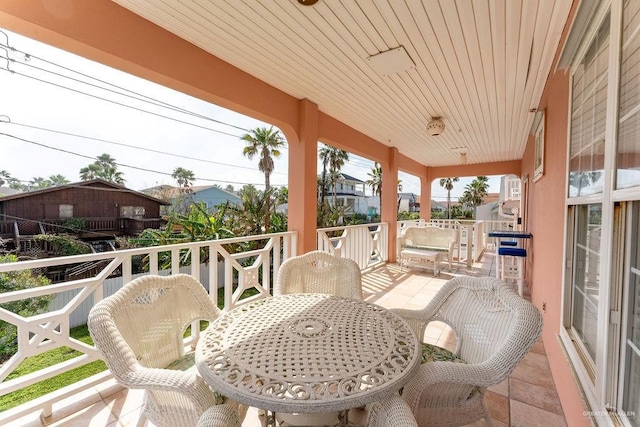 131 E Hibiscus St, South Padre Island, TX 78597 - view of patio with outdoor dining space and a balcony