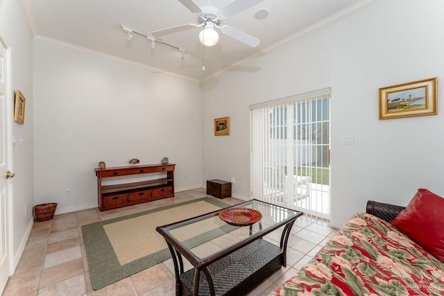 131 E Hibiscus St, South Padre Island, TX 78597 - living area with light tile patterned floors, baseboards, crown molding, and a ceiling fan
