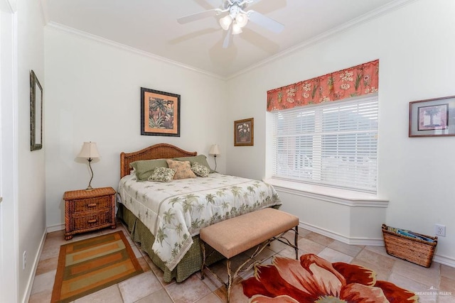 131 E Hibiscus St, South Padre Island, TX 78597 - bedroom with light tile patterned floors, a ceiling fan, baseboards, and ornamental molding