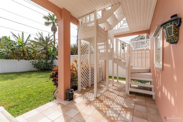 131 E Hibiscus St, South Padre Island, TX 78597 - view of patio with a fenced backyard and stairs