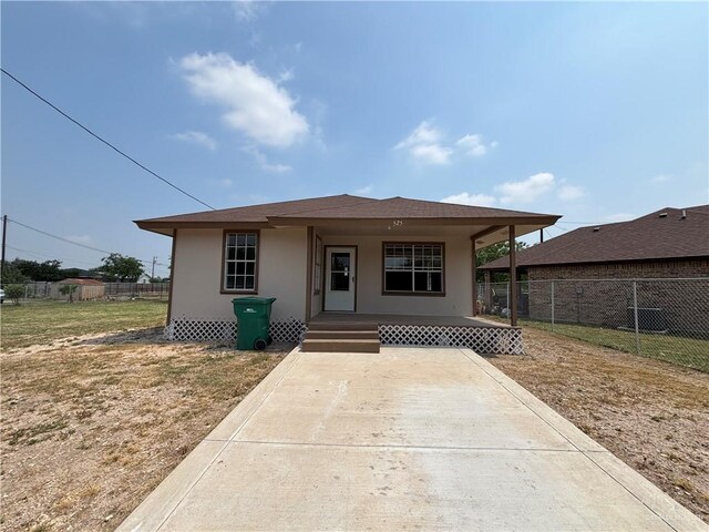 521 E Sherrye Ln, Pharr, TX 78577 - bungalow with stucco siding and covered porch