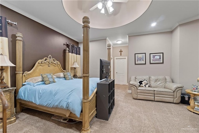 bedroom featuring carpet flooring, ceiling fan, and crown molding