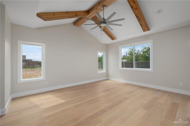 spare room with ceiling fan, light wood-style flooring, and baseboards