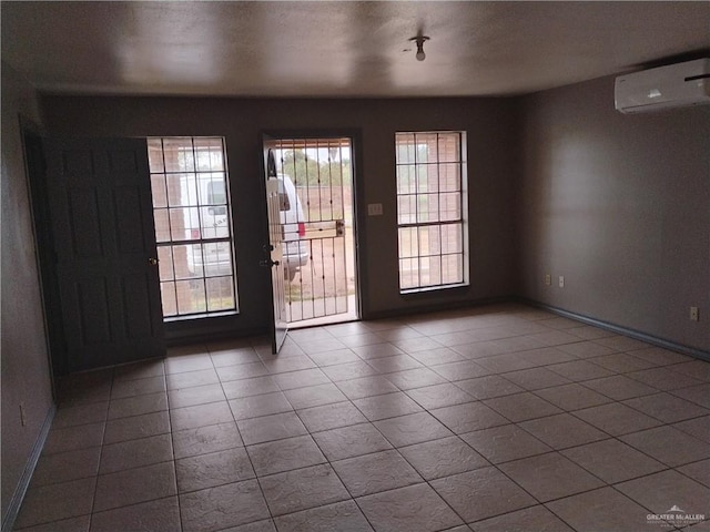 entryway with a wall mounted air conditioner