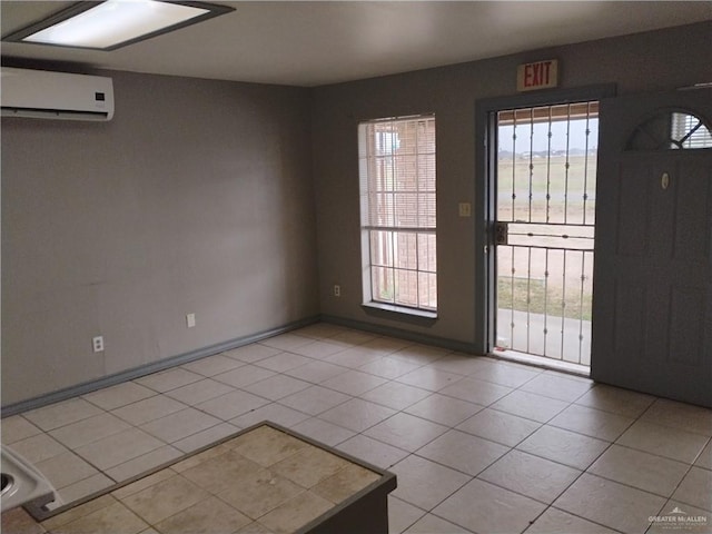 tiled entrance foyer with a wall mounted AC