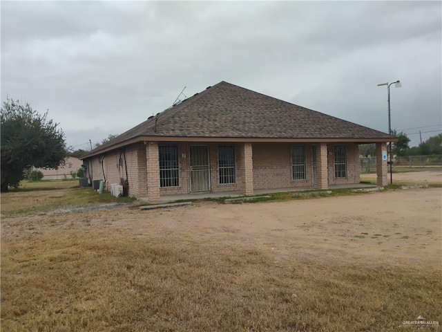 view of front of property with cooling unit