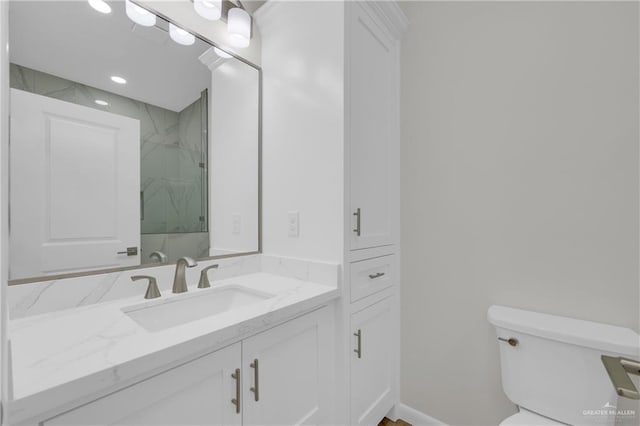 2205 Cardinal Dr, Weslaco, TX 78596 - full bathroom with vanity, a marble finish shower, and recessed lighting