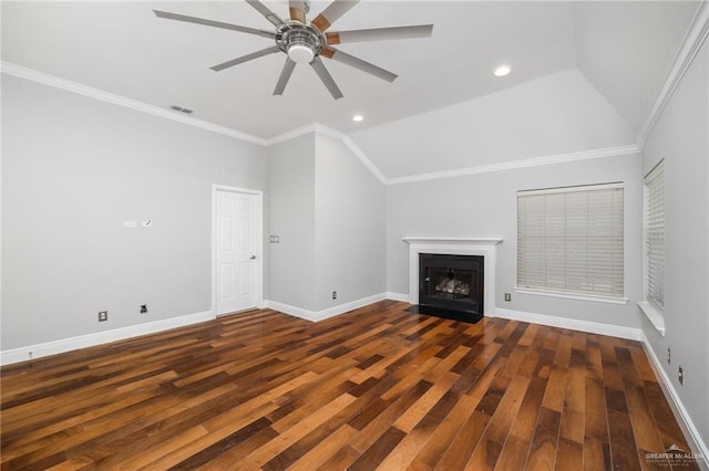 unfurnished living room featuring ceiling fan, crown molding, dark wood-type flooring, and vaulted ceiling