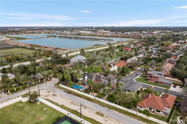 birds eye view of property featuring a water view