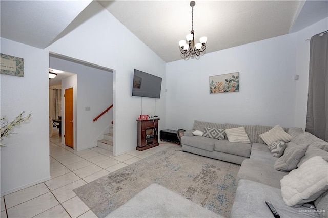 living room with light tile patterned floors, lofted ceiling, and an inviting chandelier