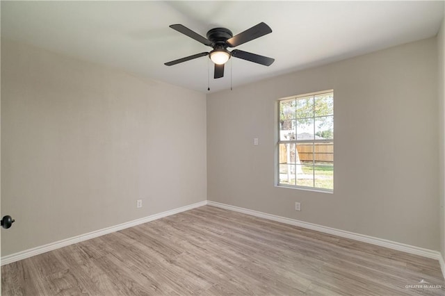 unfurnished room featuring ceiling fan and light hardwood / wood-style floors