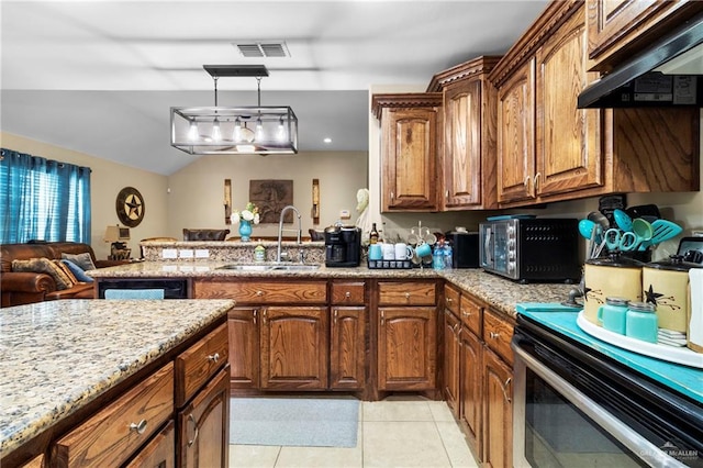512 S Mina De Oro St, Mission, TX 78572 - kitchen featuring a sink, under cabinet range hood, light stone countertops, light tile patterned floors, and a peninsula