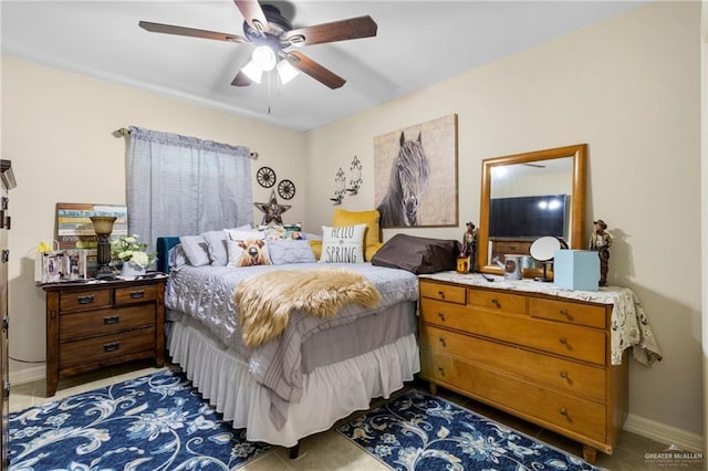 512 S Mina De Oro St, Mission, TX 78572 - bedroom featuring light tile patterned floors, a ceiling fan, and baseboards