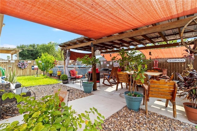 512 S Mina De Oro St, Mission, TX 78572 - fenced backyard featuring a patio, outdoor dining space, and a pergola