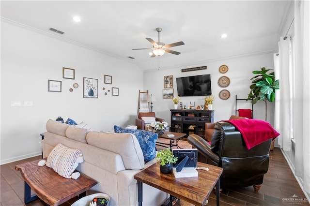 living room featuring ceiling fan, dark hardwood / wood-style flooring, and ornamental molding