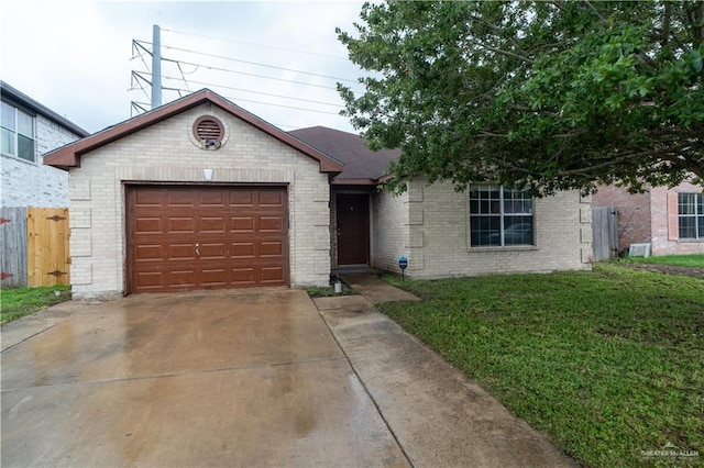 1306 Denver St, Edinburg, TX 78541 - ranch-style house with driveway, brick siding, and an attached garage