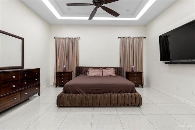4805 Galilea St, Edinburg, TX 78542 - bedroom with a raised ceiling, light tile patterned floors, baseboards, and ceiling fan