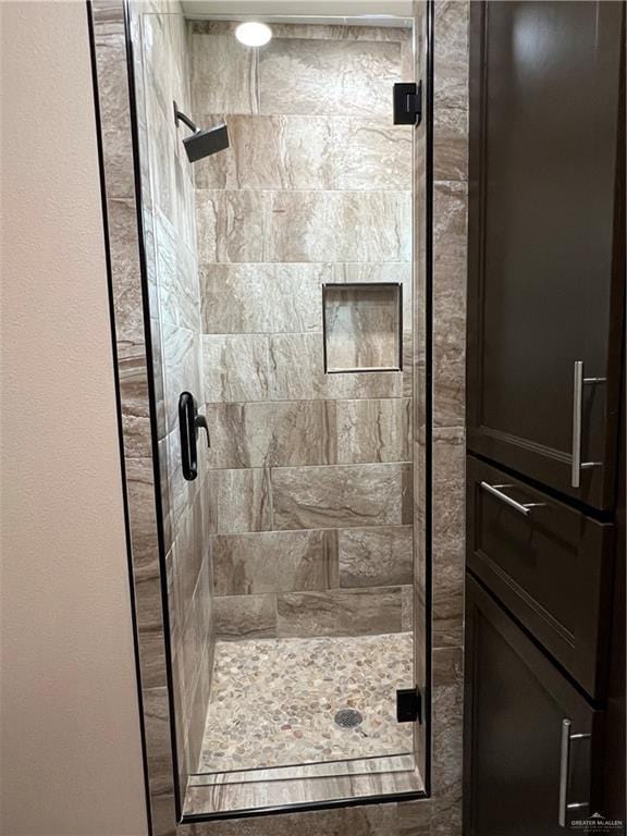 bathroom with a stall shower