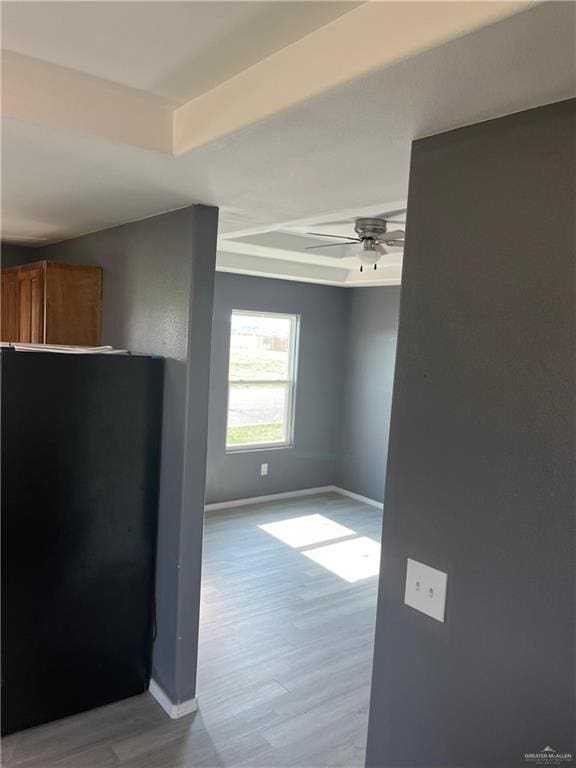 121 N Kentucky St, Mission, TX 78573 - unfurnished room featuring baseboards, wood finished floors, and a ceiling fan