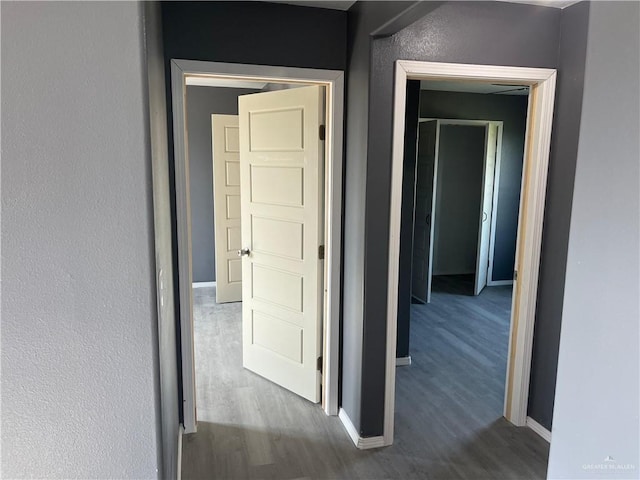 121 N Kentucky St, Mission, TX 78573 - corridor with dark wood-type flooring and baseboards